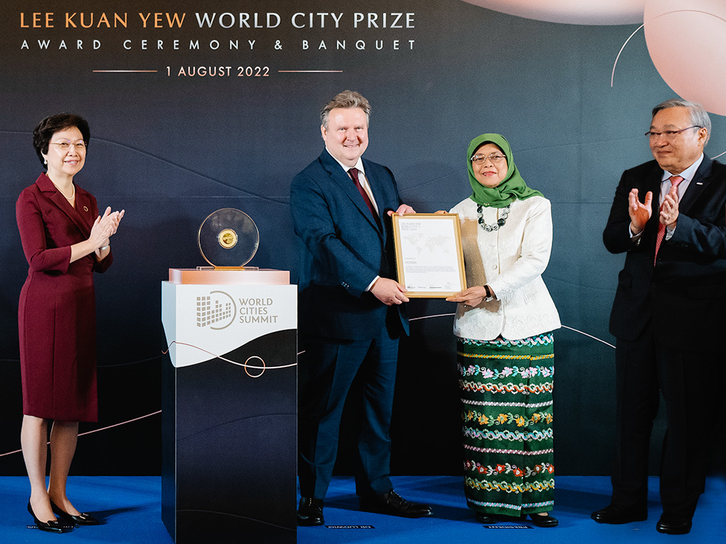 Award presentation to Vienna the 2020 Prize Laureate by President Halimah Yacob