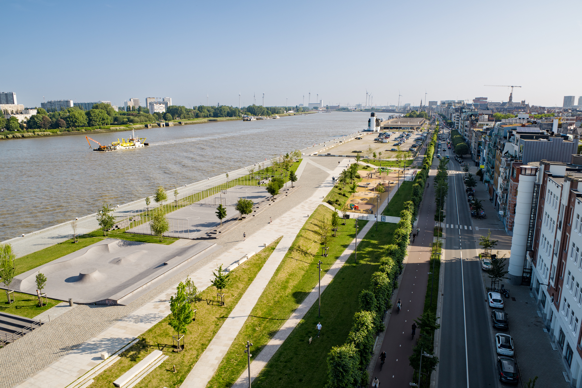 Antwerp converts infrastructure barriers into community connectors through long-term planning and climate resilience initiatives.