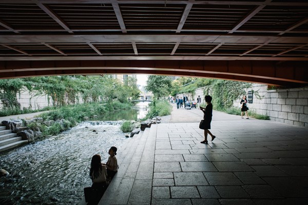 A gathering space under a bridge in Cheonggyecheon