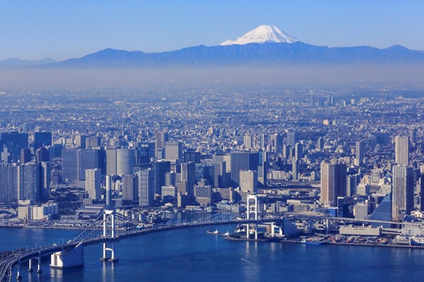 The city of Tokyo against the backdrop of Mount Fuji