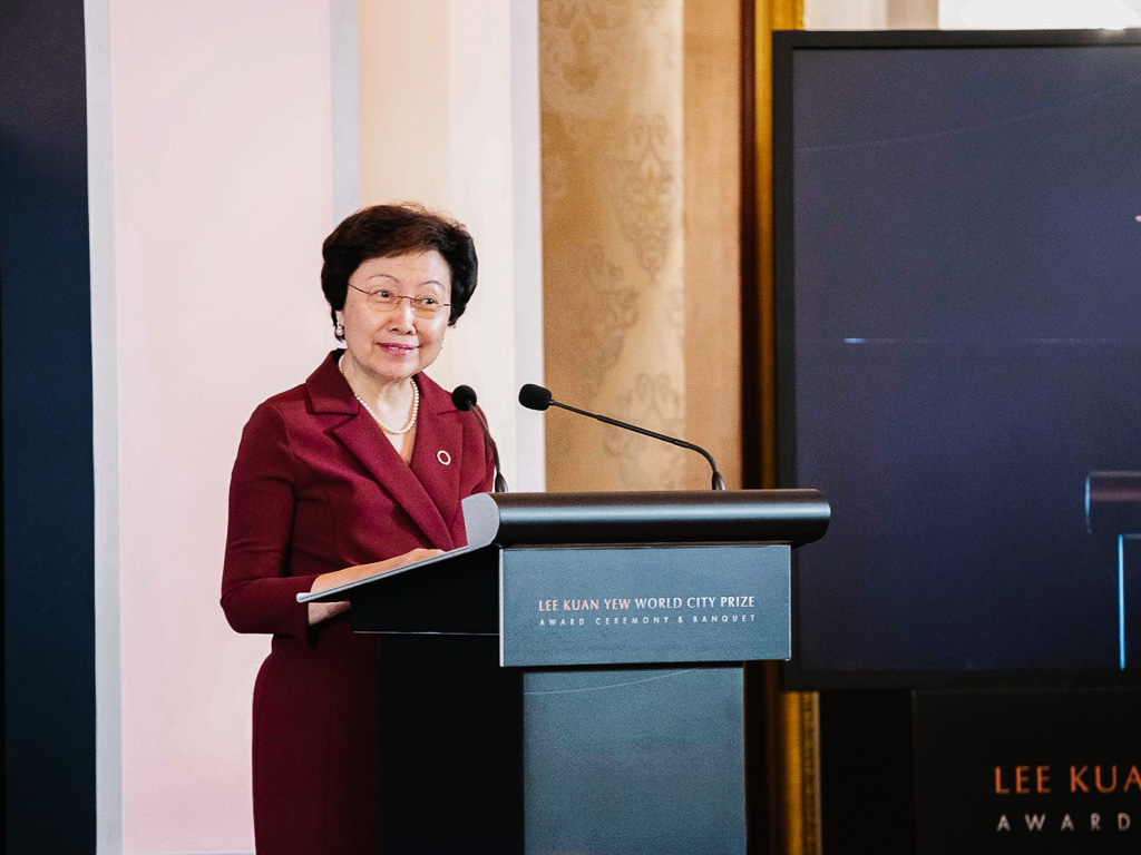 Dr Cheong Koon Hean reading the citation for Vienna