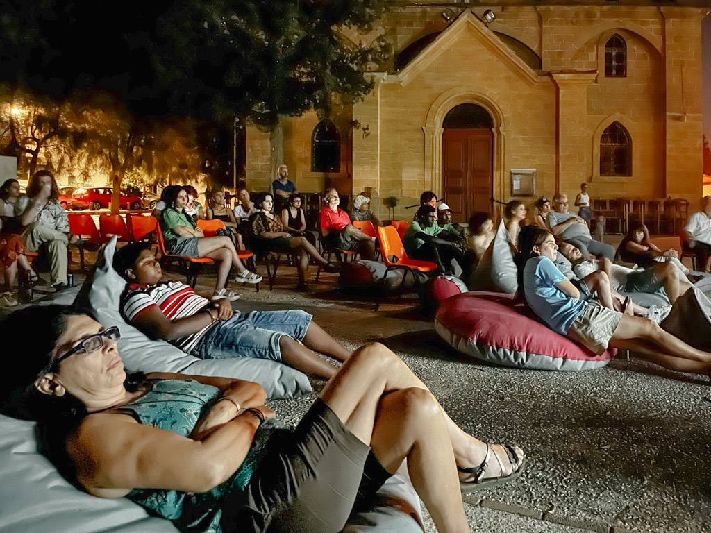 Outdoor film screenings during the Pame Kaimakli festival often include works that explore Kaimakli’s heritage and stories, centring the experience on the neighbourhood’s identity